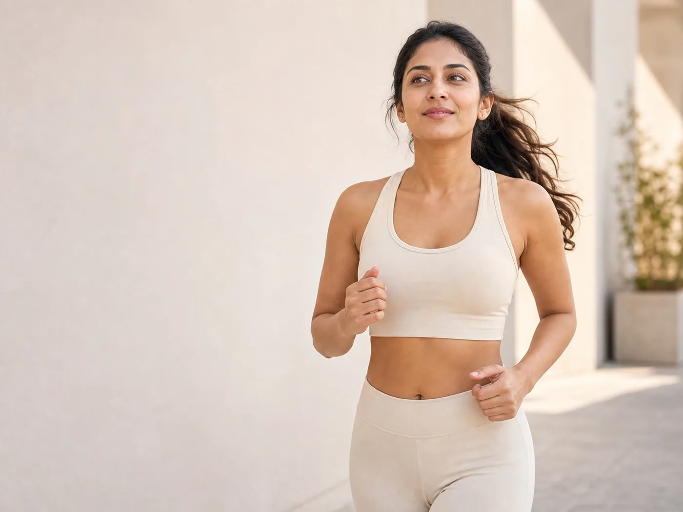 South Indian woman and health professional reviewing energy, sleep and metabolic health trends together